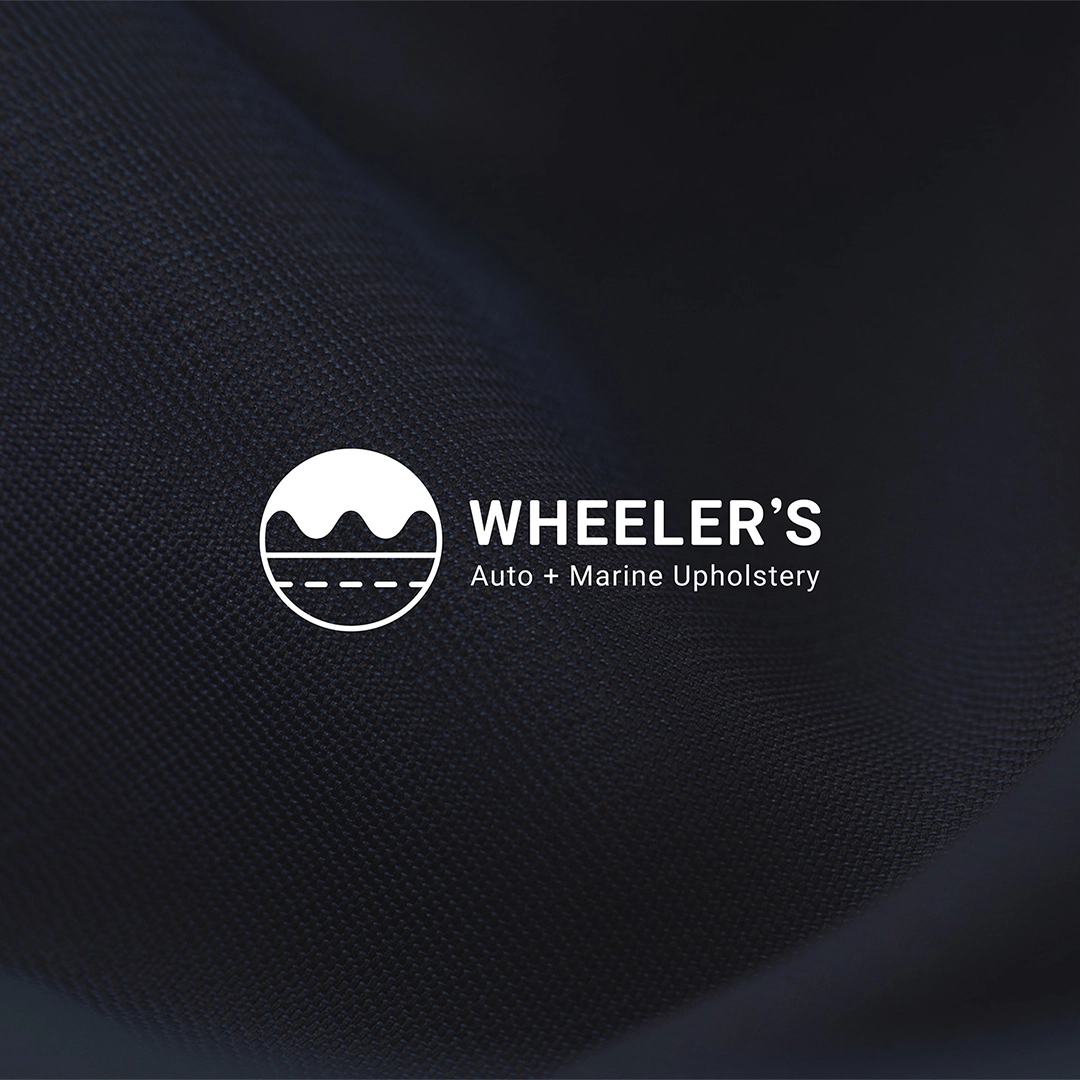 Wheeler's Auto Marine And Upholstery Logo